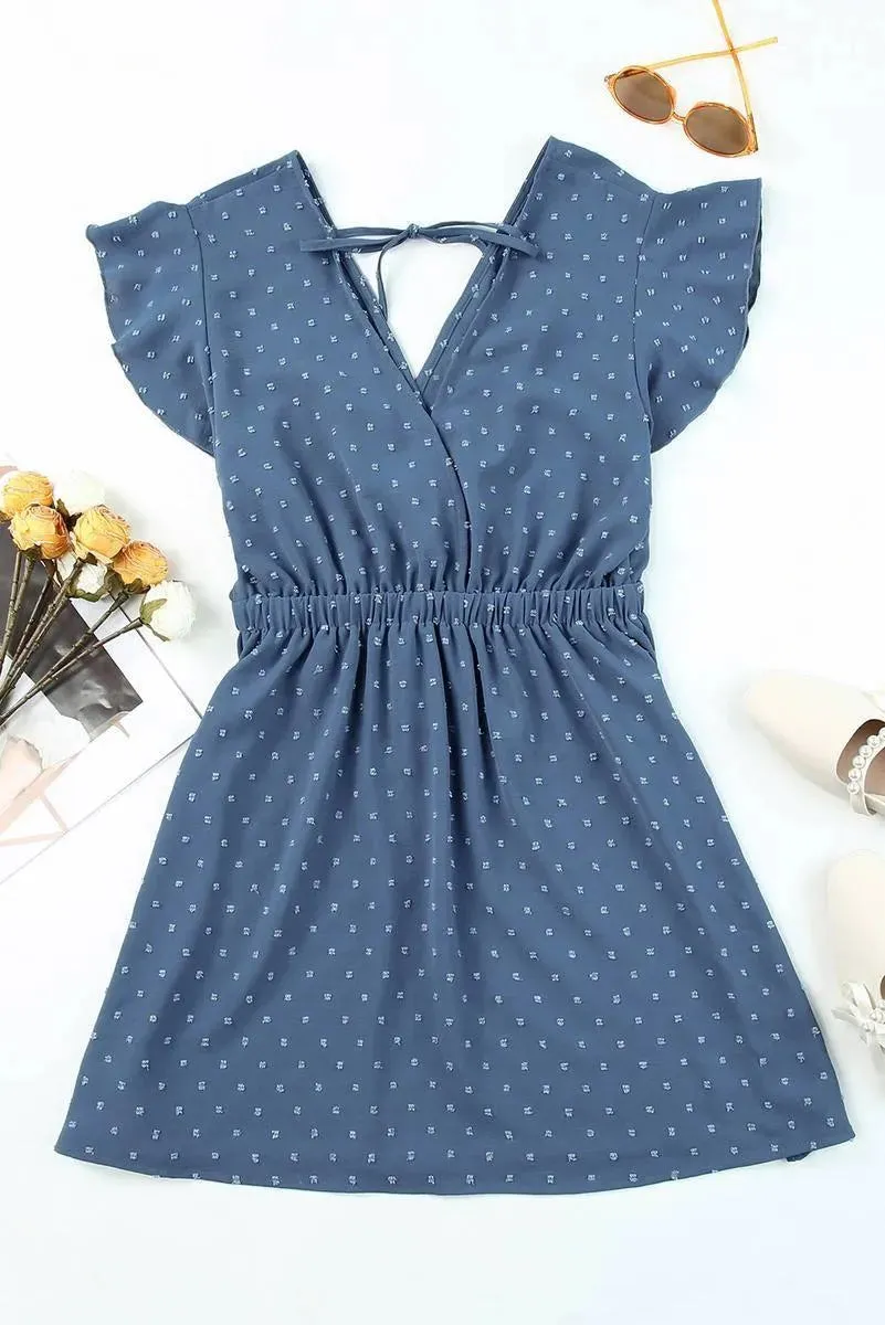 Get Beach-Ready with our Swiss Dot V Neck Wrap Dress - Shop Now!